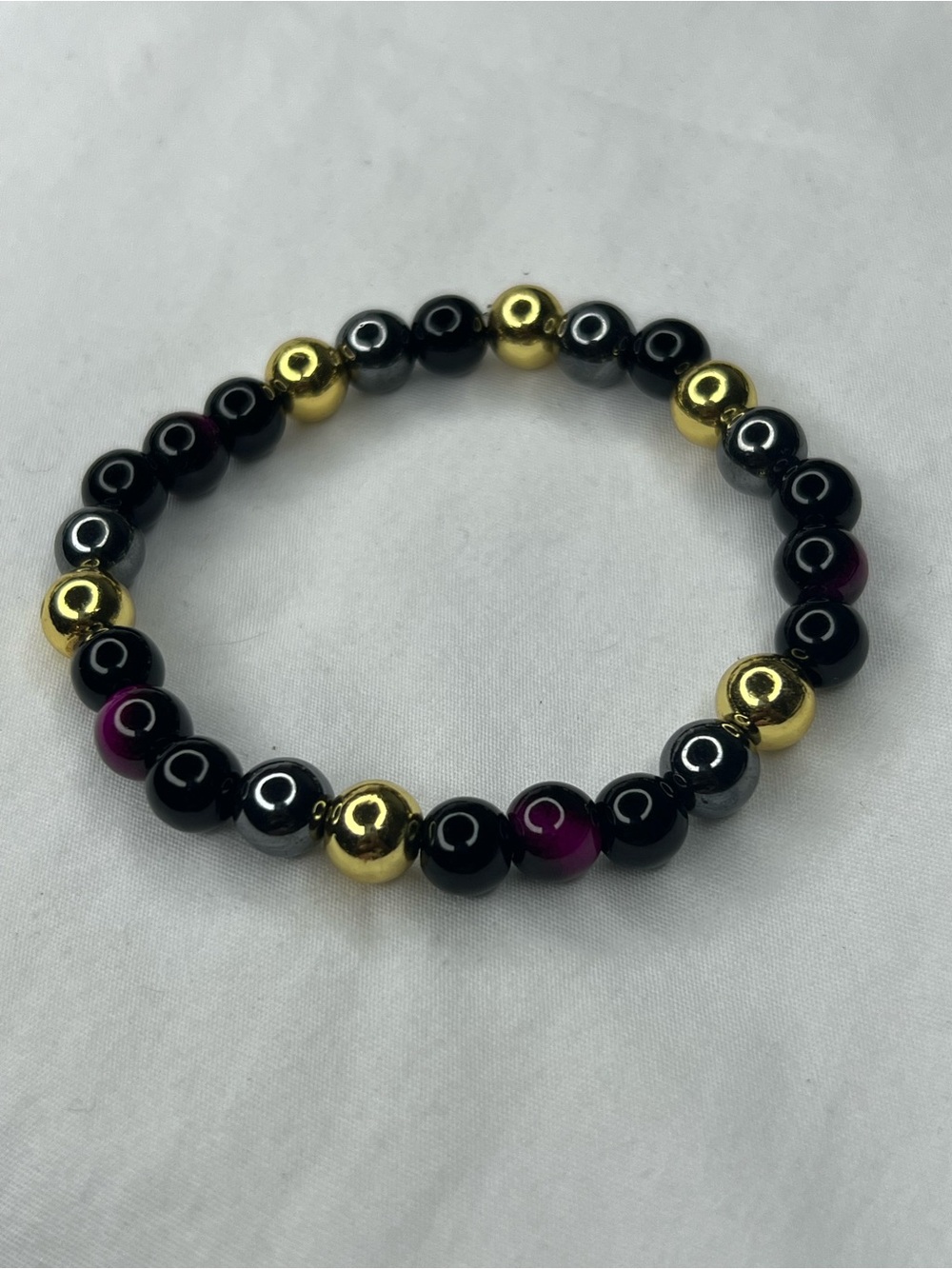 Gold & Black Beaded Stretch Bracelet with Purple Tiger eyes Accents